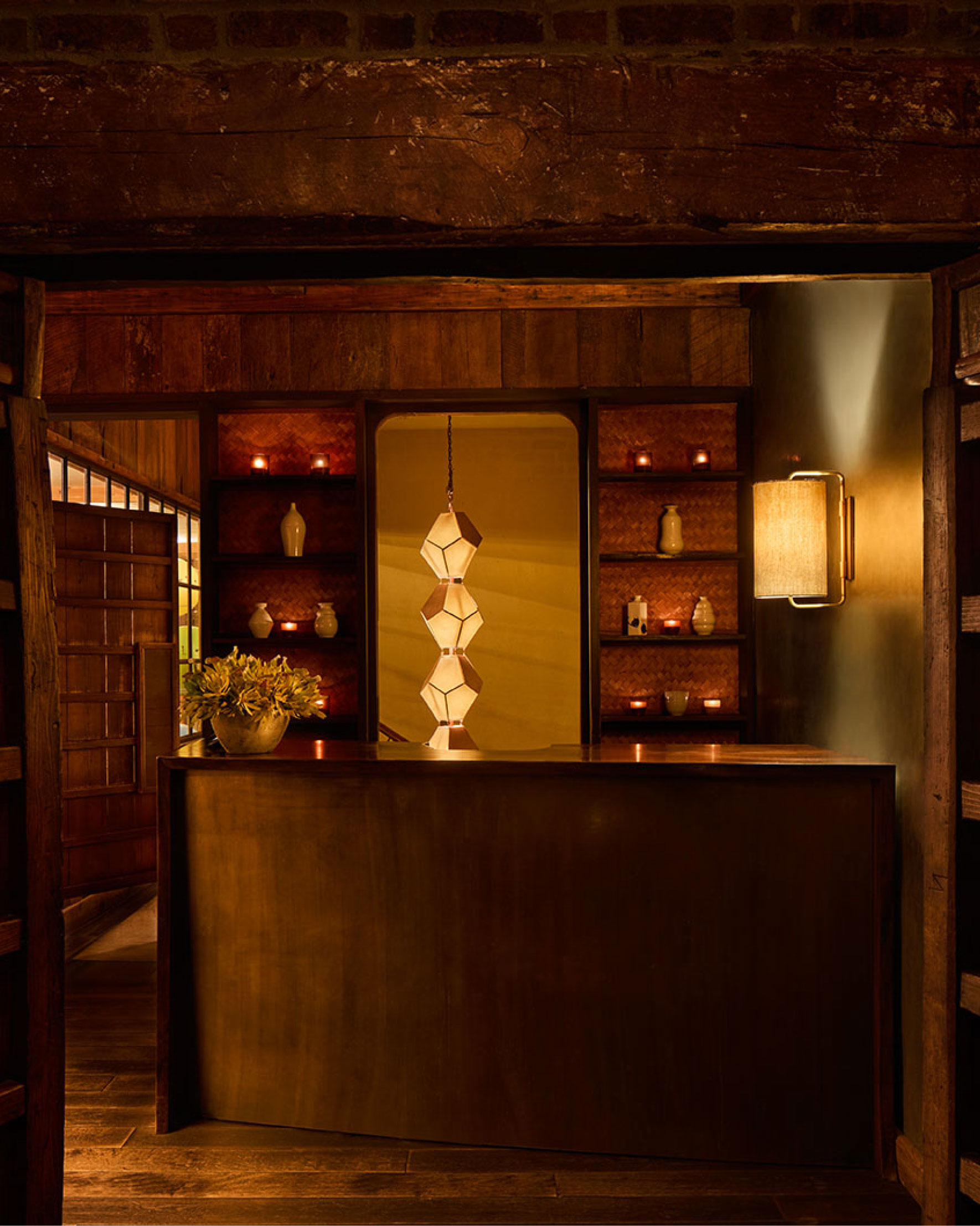 Looking through a doorway at the front desk inside the Shibui Spa