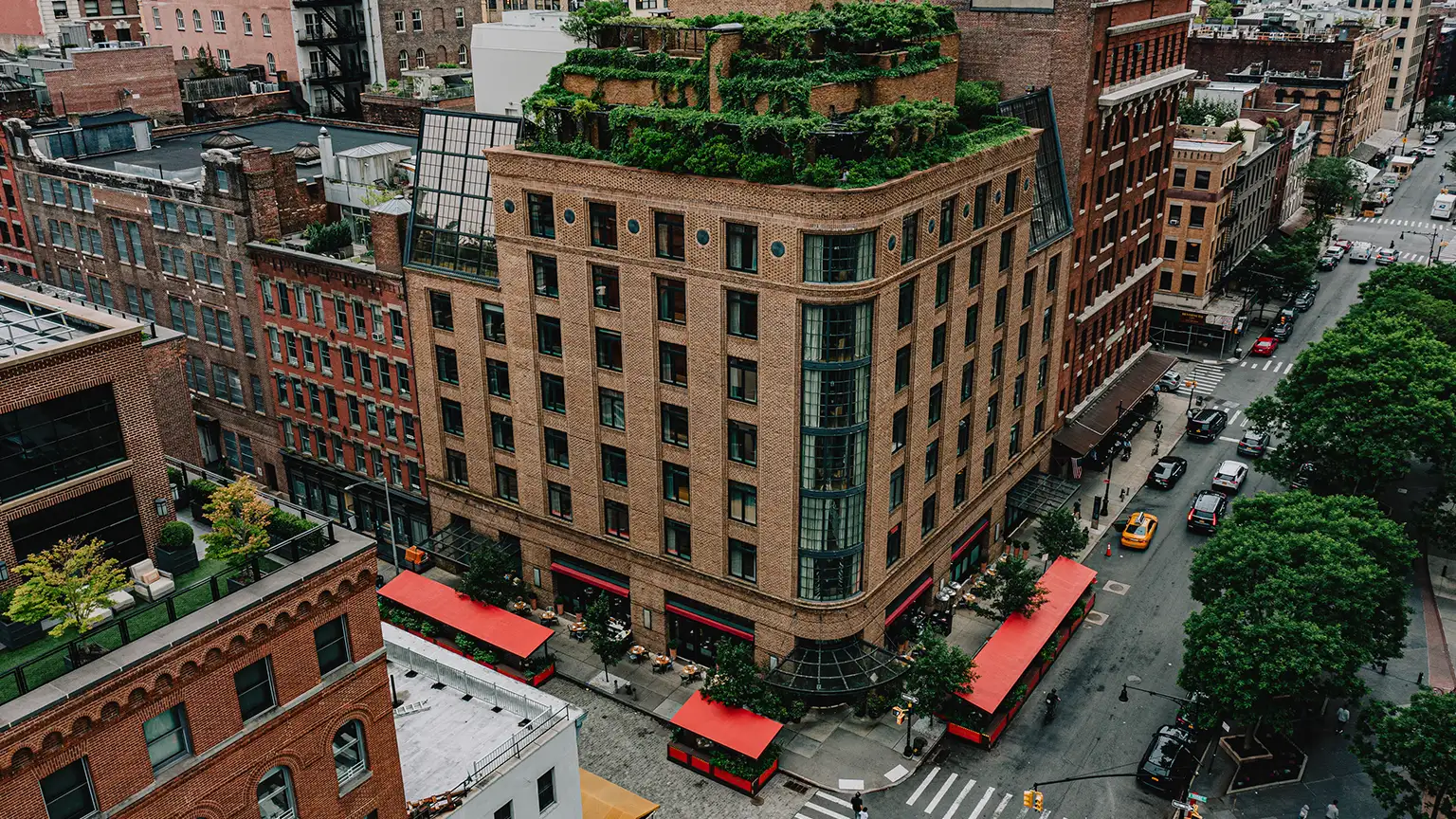 A Drone view of the exterior of the Greenwich Hotel showing a wide shot of the hotel and it's surrounding TriBeCa neighborhood